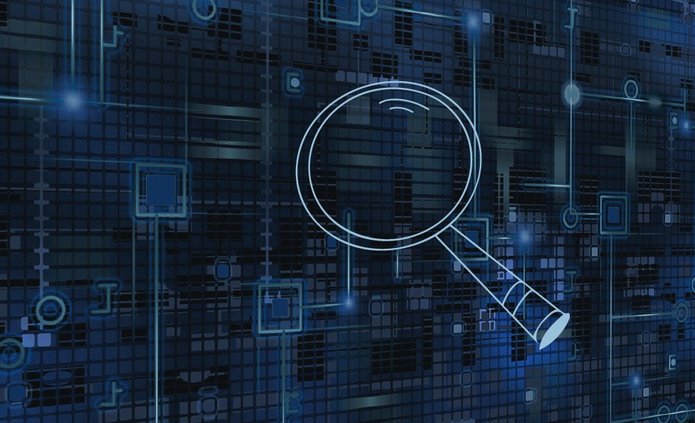 Lupa na tle wizualizacji danych.