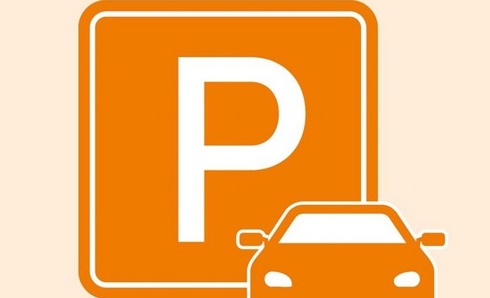 pomarańczowa litera "P" oznaczająca parking, obok z prawej strony pomarańczowy samochód